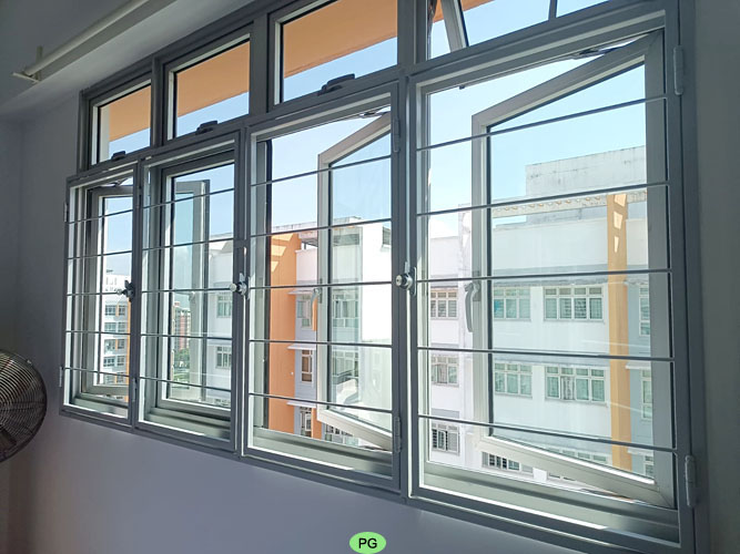 Swing open slim window grill Singapore design for easy cleaning
