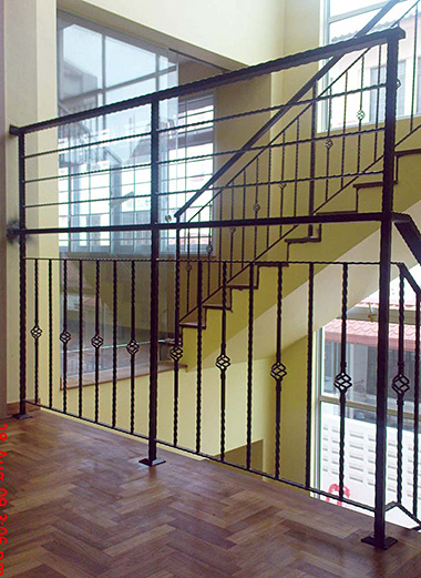 Wrought iron staircase railing for indoor staircase